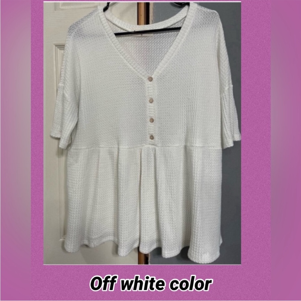 Cute babydoll style top has stretch to it